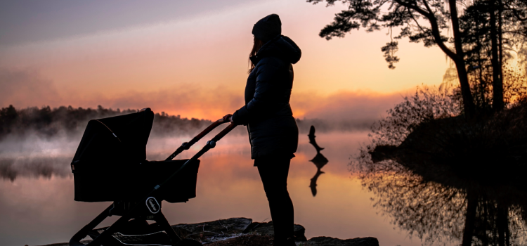 A woman looks at nature with her child